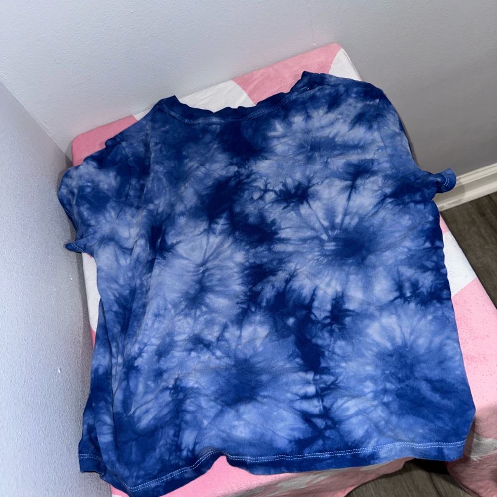 Blue shirt with a rainbow